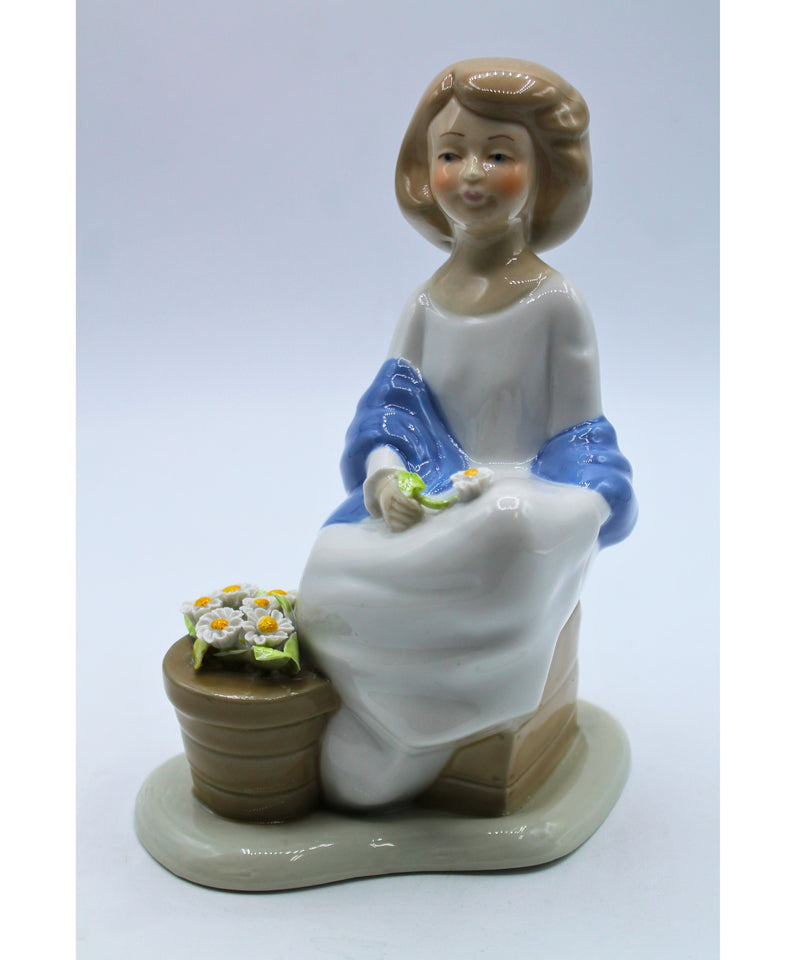 Woman with Flowers Figurine | Broken Leaf